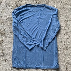 Three quarters length sleeve blue shirt